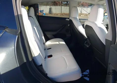 2023 Tesla Model Y Awd/Long Range Dual Motor All-Wheel Drive z USA, uszkodzony, nr VIN 7SAYGDEE9PF891902